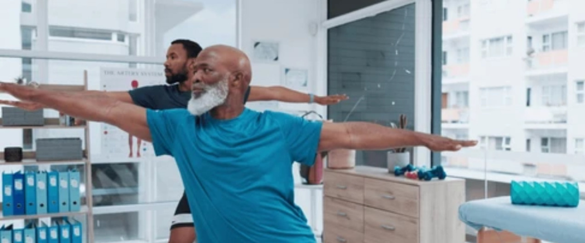 two men stretching in office setting for workplace wellness